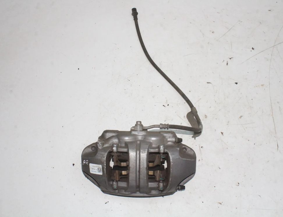 TESLA Model Y 1 generation (2020-2024) Супорт тормозов передний правый 1188622-00-D 33099751