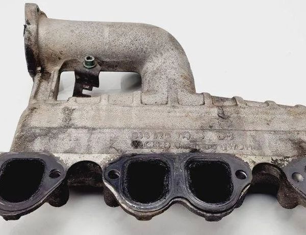 VOLKSWAGEN Golf 5 generation (2003-2009) Впускной коллектор 038129713J 31101830