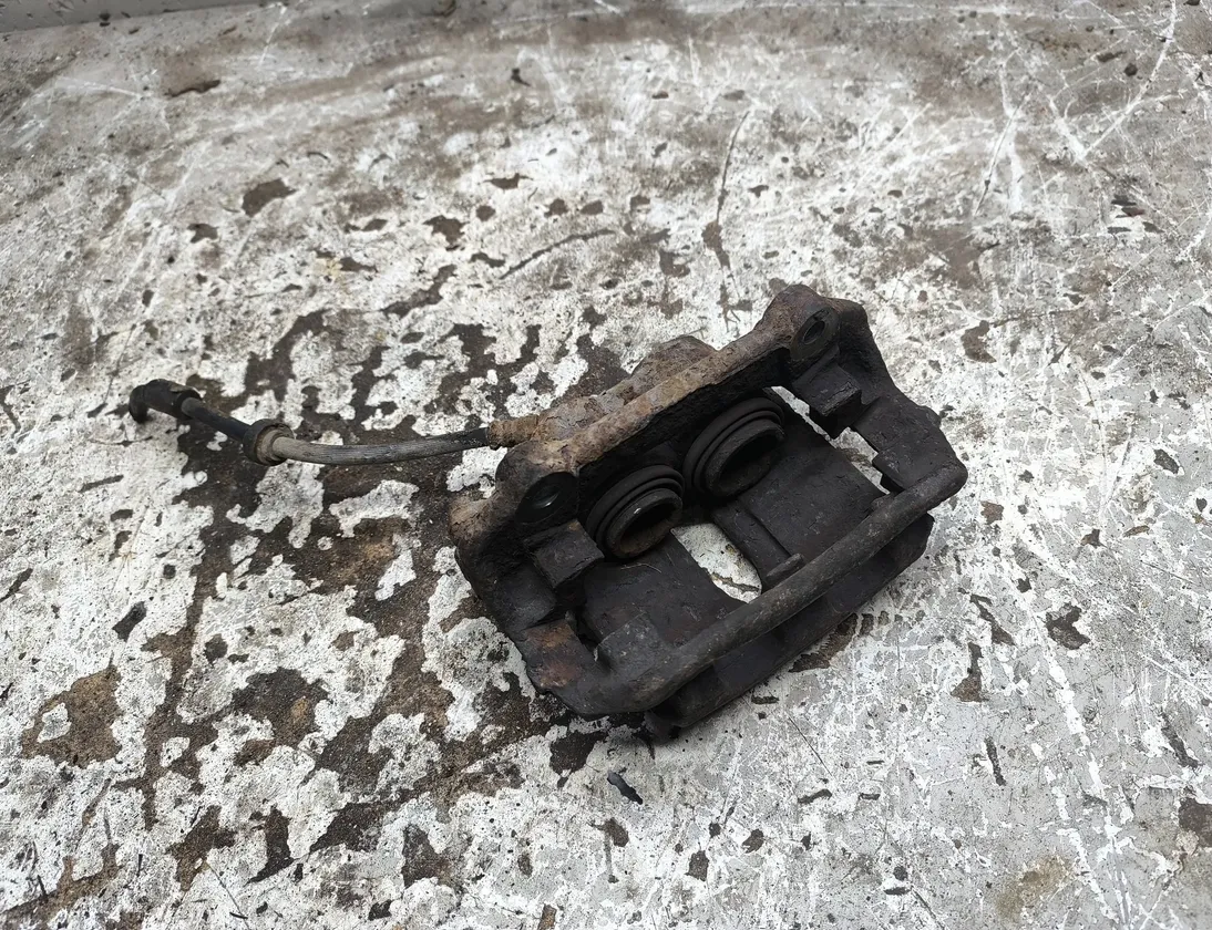 OPEL Vivaro A (2002-2006) Супорт тормозов передний левый 34496351