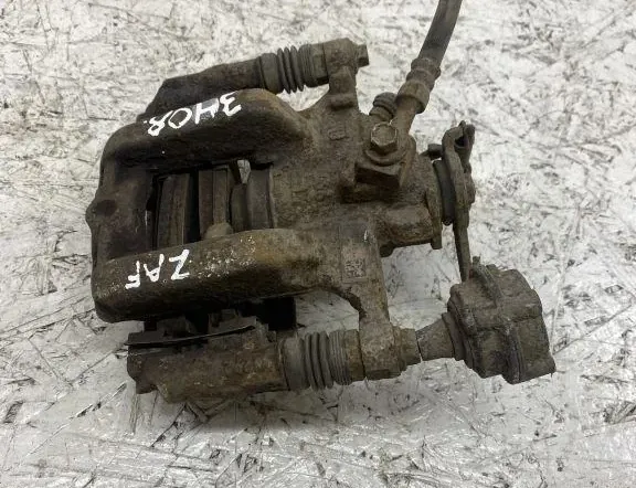 OPEL Zafira C (2012-2016) Zadný pravý brzdový strmeň 33469254