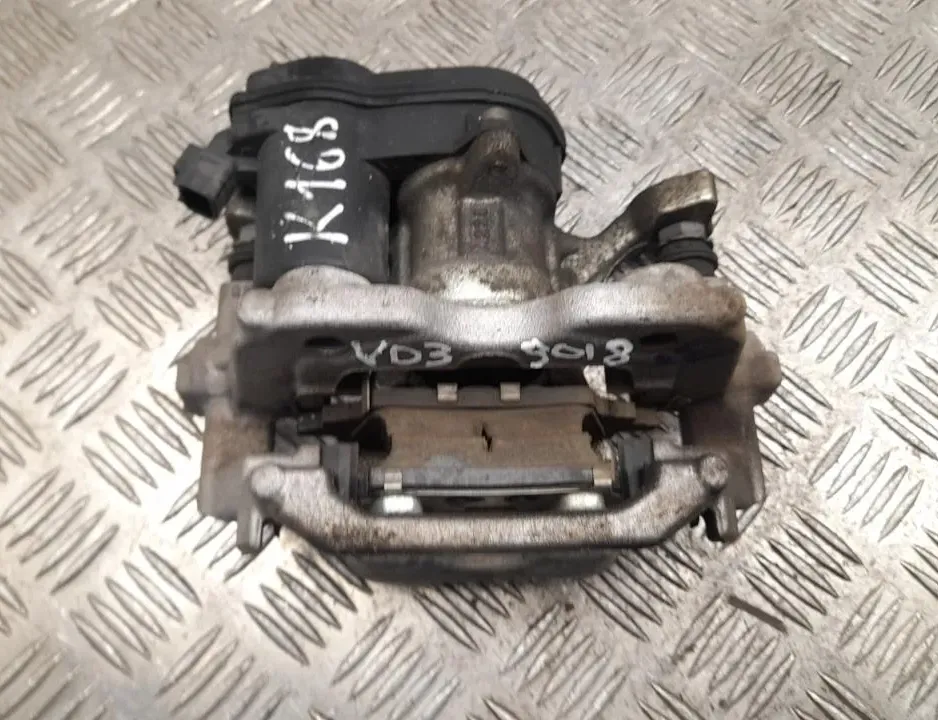 TOYOTA Yaris 4 generation (2020-2023) Супорт тормозов задний левый 33564981